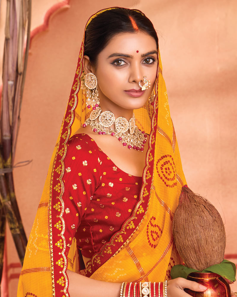 Vishal Prints Yellowish Orange Bandhani Print Chiffon Saree With Foil Print And Fancy Border