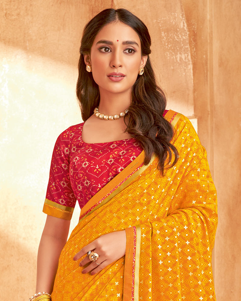Vishal Prints Orange Printed Georgette Saree With Foil Print And Fancy Zari Border