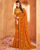 Vishal Prints Rusty Orange Printed Georgette Saree With Foil Print And Fancy Zari Border