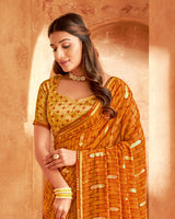 Vishal Prints Rusty Orange Printed Georgette Saree With Foil Print And Fancy Zari Border