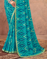 Vishal Prints Teal Blue Printed Georgette Saree With Foil Print And Zari Border