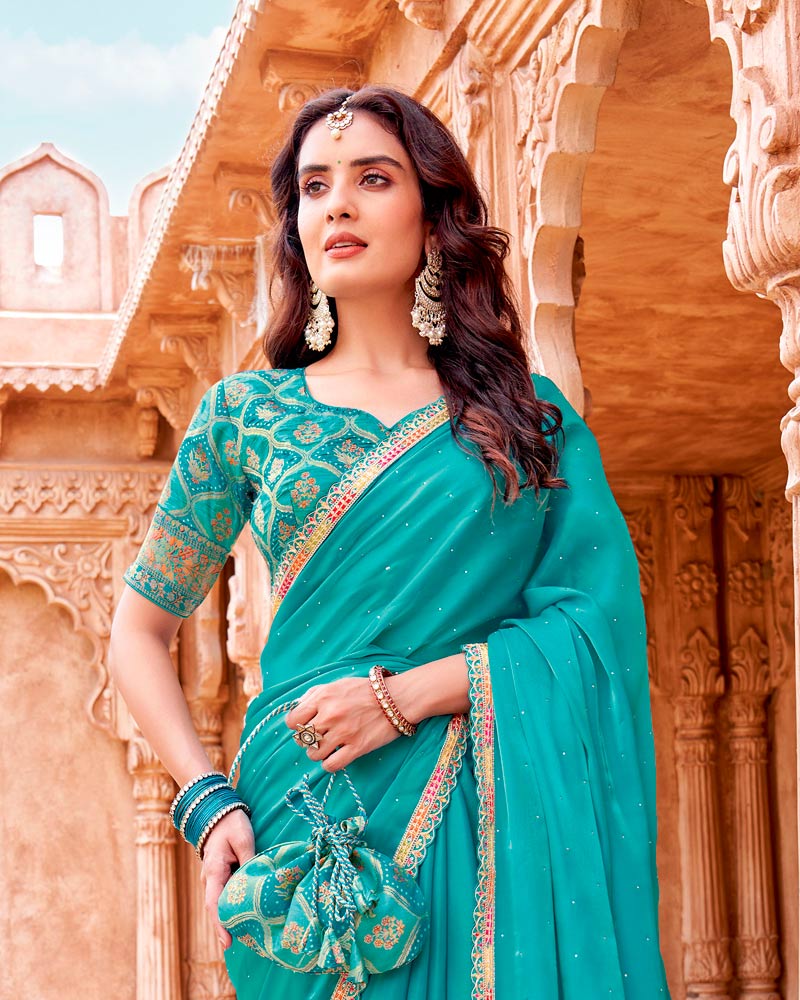 Vishal Prints Fountain Blue Designer Organza Saree With Diamond Work And Embroidery Cut Work Border (With Matching Potli Bag)