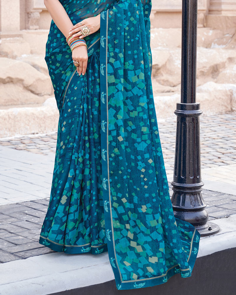 Vishal Prints Dark Aqua Blue Printed Brasso Saree With Fancy Border