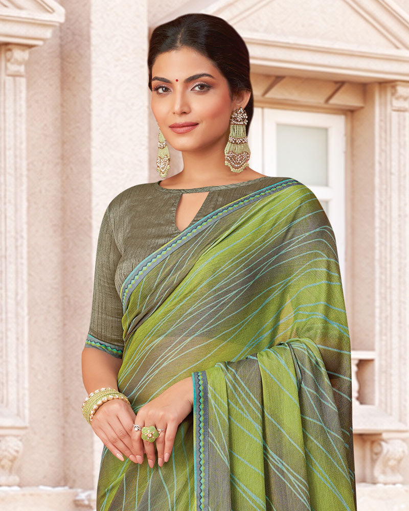 Vishal Prints Khaki Green Printed Brasso Saree With Fancy Border