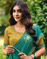 Vishal Prints Teal Blue Traditional Printed Fancy Chiffon Saree With Foil Print And Embroidery Border