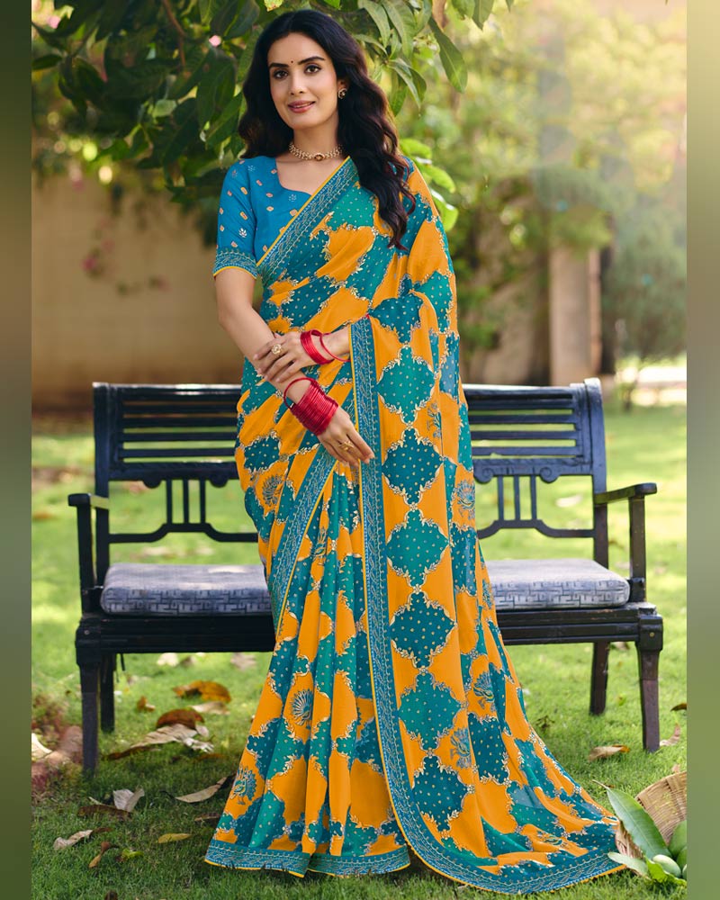 Vishal Prints Carrot Orange And Teal Green Printed Fancy Chiffon Traditional Print Saree With Foil Print And Embroidery Border