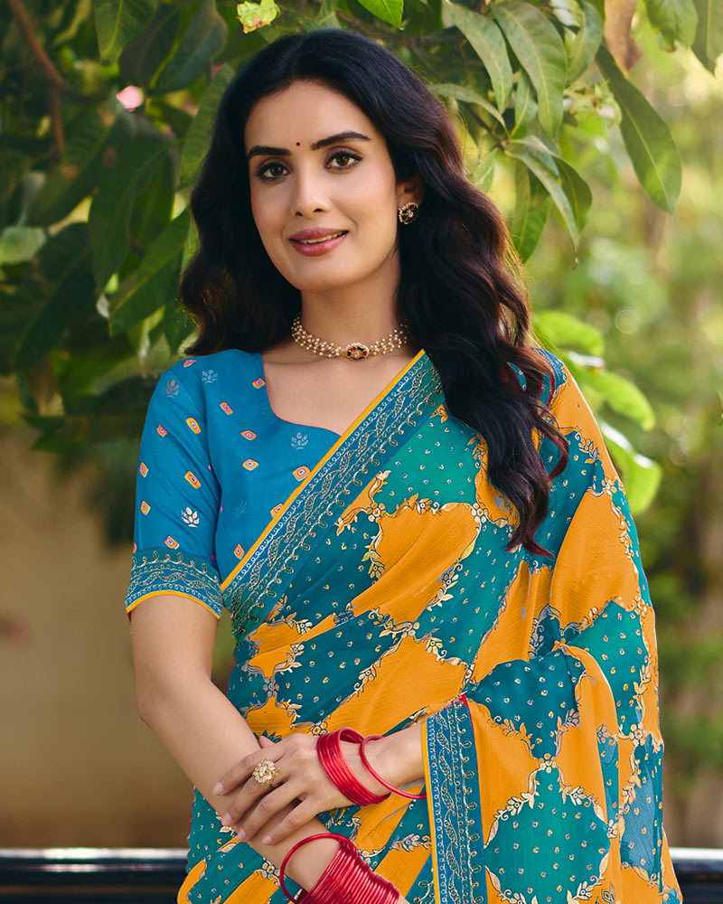 Vishal Prints Carrot Orange And Teal Green Printed Fancy Chiffon Traditional Print Saree With Foil Print And Embroidery Border