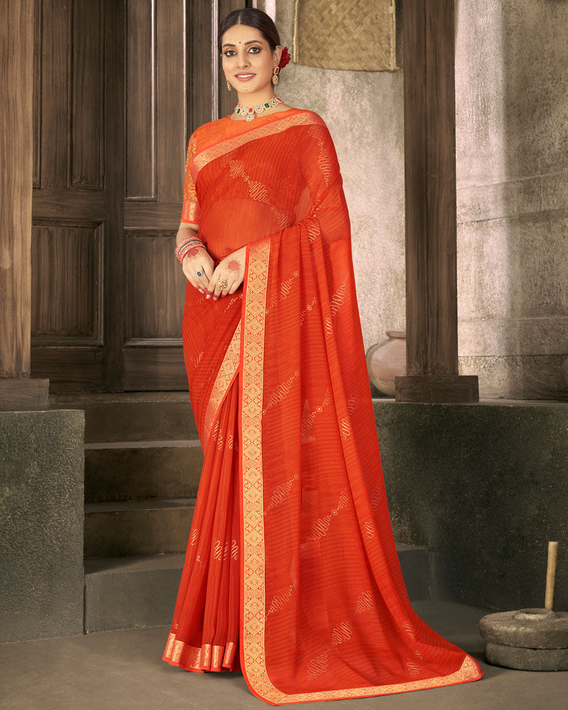 Vishal Prints Dark Orange Georgette Saree With Foil Print And Zari Border