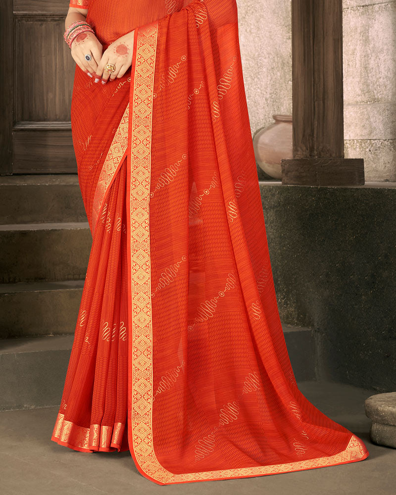 Vishal Prints Dark Orange Georgette Saree With Foil Print And Zari Border