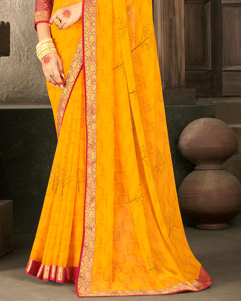 Vishal Prints Dark Yellow Georgette Saree With Foil Print And Zari Border
