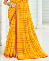 Vishal Prints Orangey Yellow Designer Chiffon Saree With Foil Print And Fancy Border