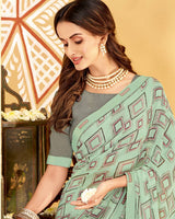 Vishal Prints Turquoise Green Printed Georgette Saree With Fancy Border