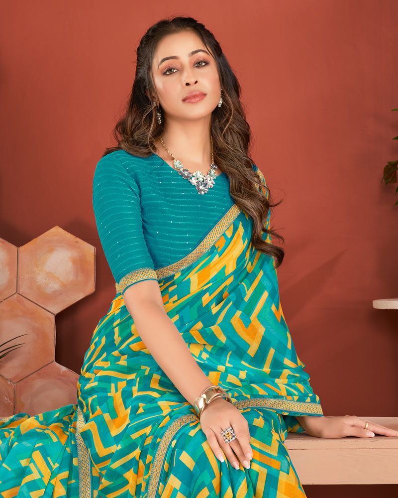 Vishal Prints Teal Blue Printed Chiffon Saree With Zari Border