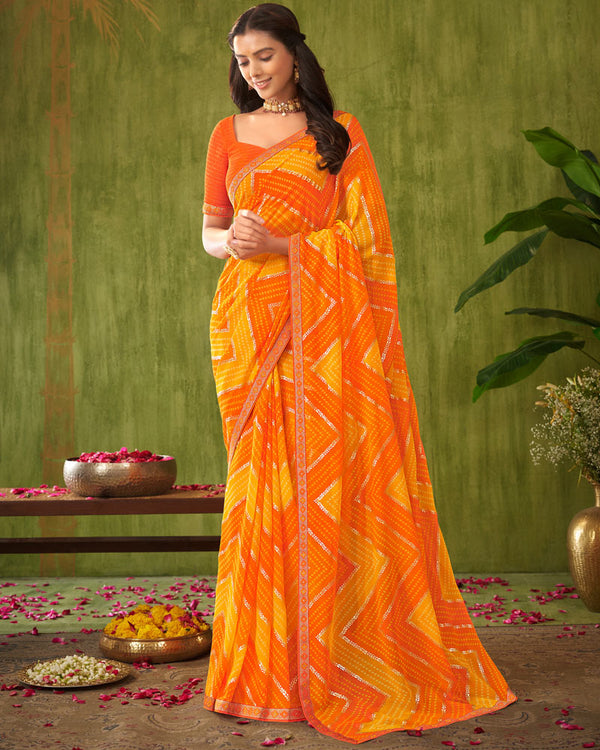 Vishal Prints Orange Printed Chiffon Saree With Foil Print And Zari Border