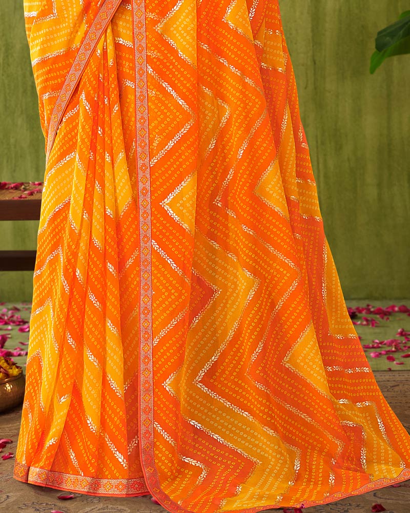 Vishal Prints Orange Printed Chiffon Saree With Foil Print And Zari Border