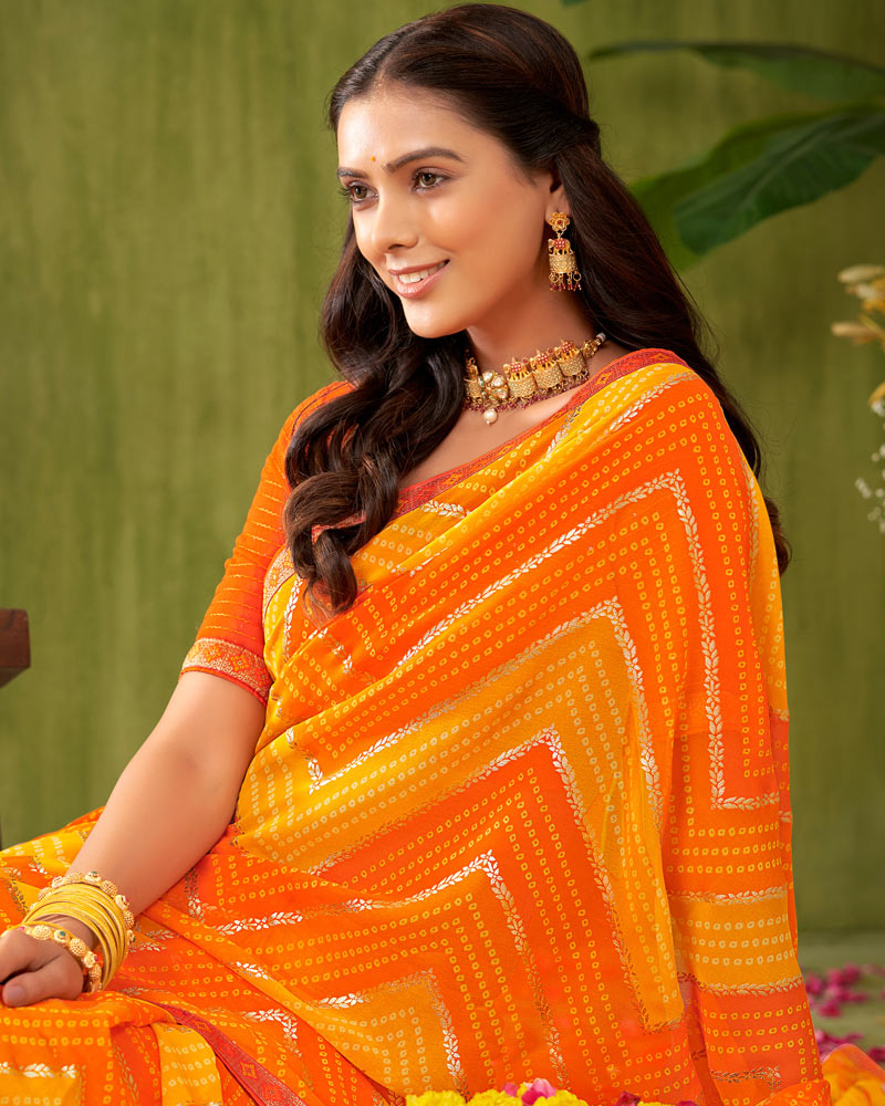Vishal Prints Orange Printed Chiffon Saree With Foil Print And Zari Border