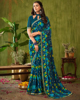 Vishal Prints Dark Teal Blue Printed Chiffon Saree With Foil Print And Zari Border