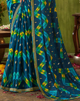 Vishal Prints Dark Teal Blue Printed Chiffon Saree With Foil Print And Zari Border