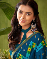 Vishal Prints Dark Teal Blue Printed Chiffon Saree With Foil Print And Zari Border