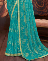 Vishal Prints Dark Turquoise Blue Printed Brasso Saree With Zari Border