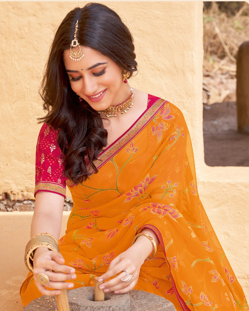 Vishal Prints Pumpkin Orange Printed Chiffon-Brasso Saree With Zari Border