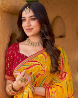 Vishal Prints Yellow Orange Printed Chiffon-Brasso Saree With Zari Border