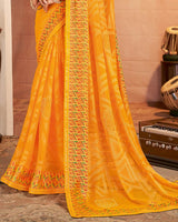 Vishal Prints Yellowish Orange Printed Brasso Saree With Diamond Work And Fancy Border