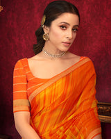 Vishal Prints Dark Orange Fancy Chiffon Saree With Foil Print And Zari Border