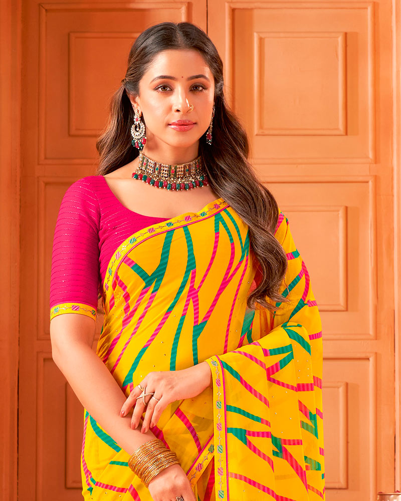 Vishal Prints Dark Burnt Yellow Printed Georgette Saree With Foil Print And Fancy Border