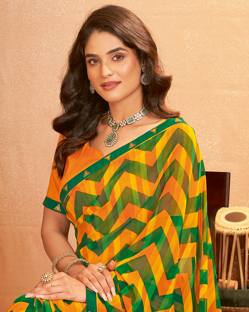 Vishal Prints Pumpkin Orange Printed Georgette Saree With Fancy Border