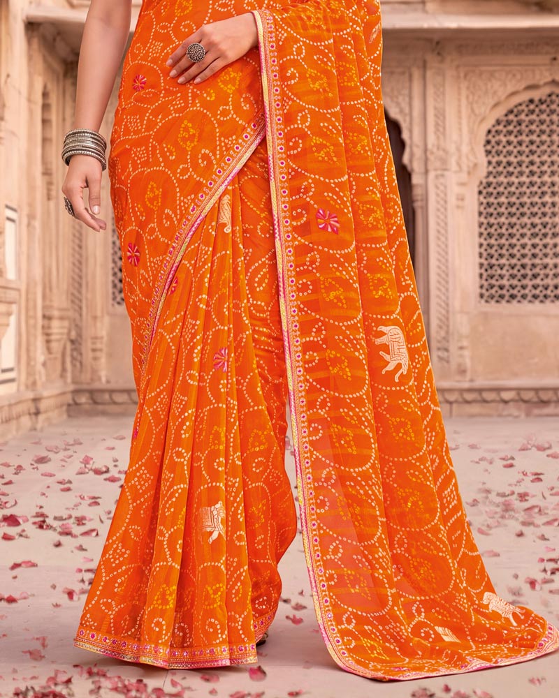 Vishal Prints Bright Orange Patterned Chiffon Traditional Print Saree With Foil Print And Fancy Embroidery Border