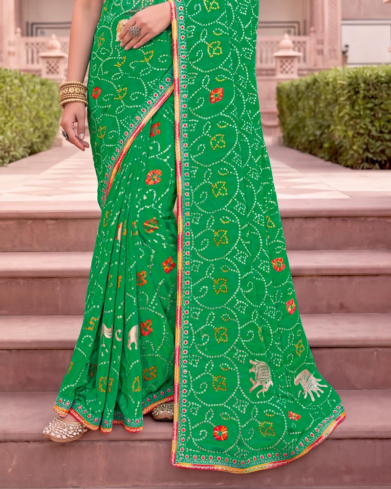 Vishal Prints Forest Green Patterned Chiffon Traditional Print Saree With Foil Print And Fancy Embroidery Border