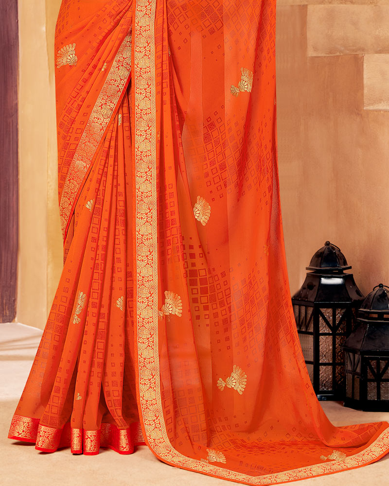 Vishal Prints Dark Orange Georgette Saree With Foil Print And Zari Border