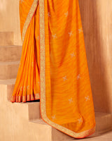 Vishal Prints Orange Georgette Saree With Foil Print And Zari Border