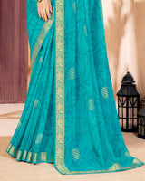 Vishal Prints Dark Turquoise Blue Georgette Saree With Foil Print And Zari Border