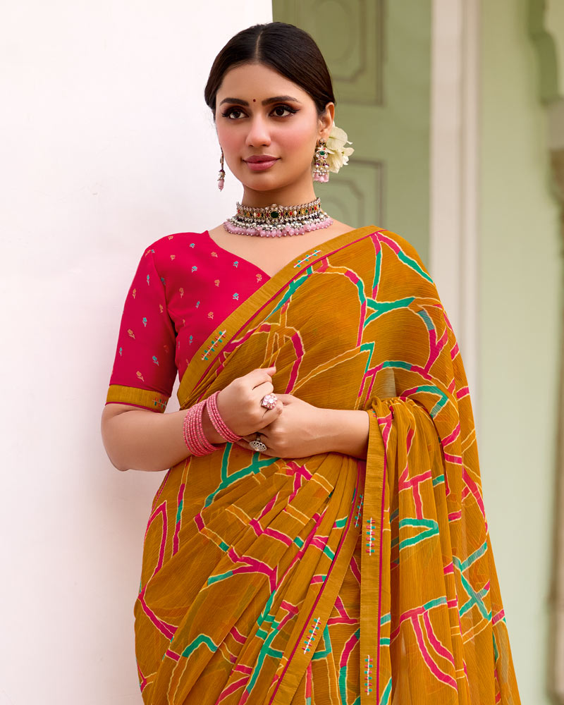 Vishal Prints Dusty Orange Printed Chiffon Saree With Zari Border