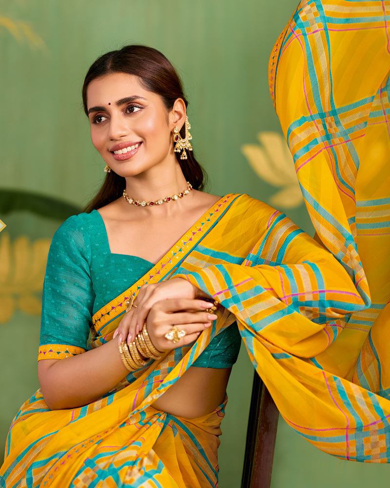 Vishal Prints Burnt Yellow Printed Chiffon Saree With Fancy Embroidery Border