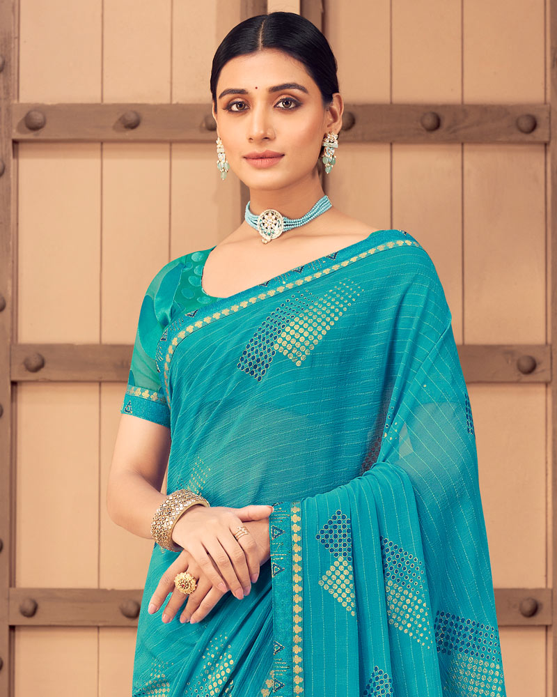 Vishal Prints Dark Turquoise Blue Patterned Georgette Saree With Foil Print And Border