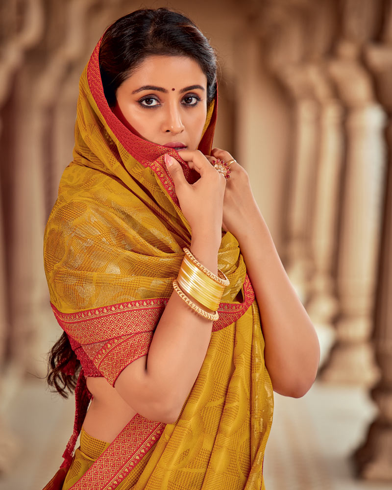 Vishal Prints Yellow Ochre Printed Georgette Saree With Foil Print And Zari Border