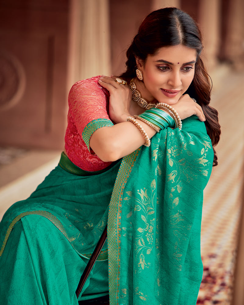Vishal Prints Teal Green Printed Georgette Saree With Foil Print And Zari Border