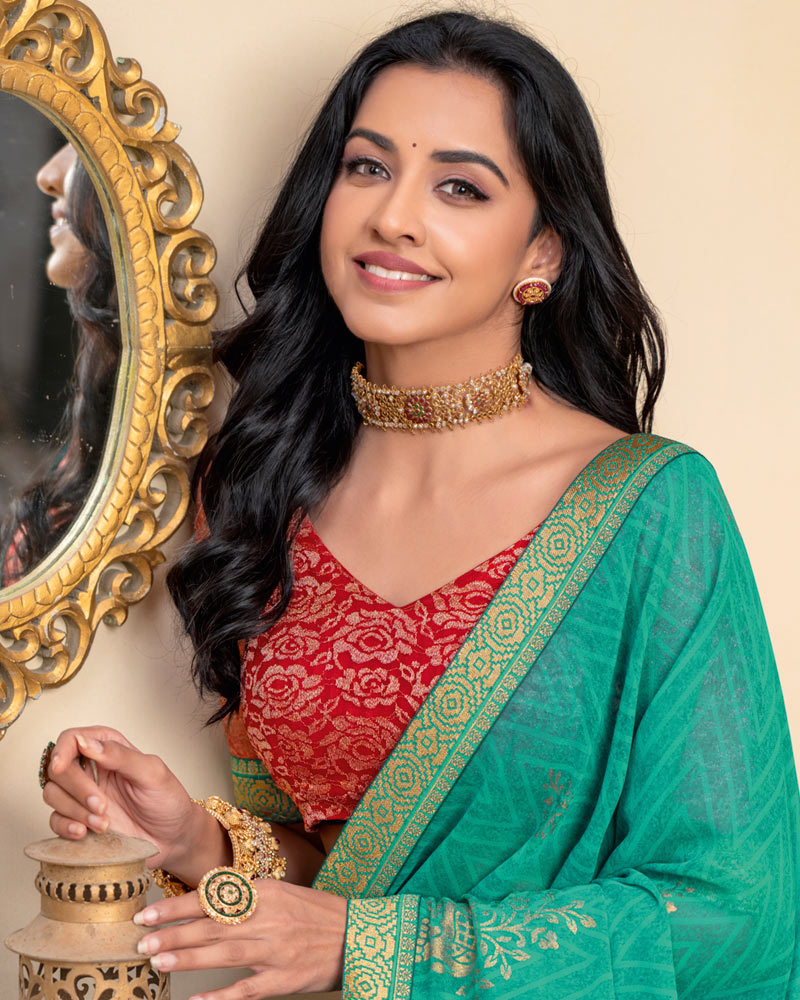 Vishal Prints Persian Green Georgette Saree With Foil Print And Zari Border