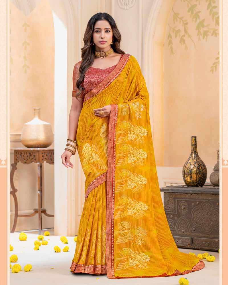 Vishal Prints Burnt Yellow-Orange Georgette Saree With Foil Print And Zari Border