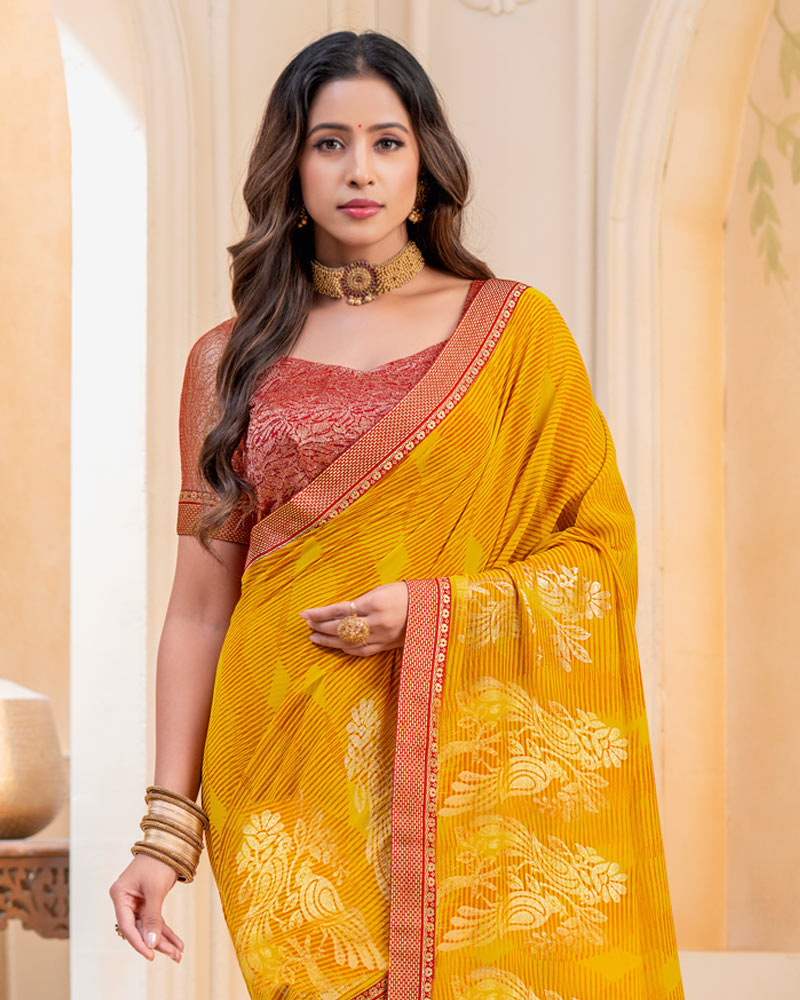 Vishal Prints Burnt Yellow-Orange Georgette Saree With Foil Print And Zari Border