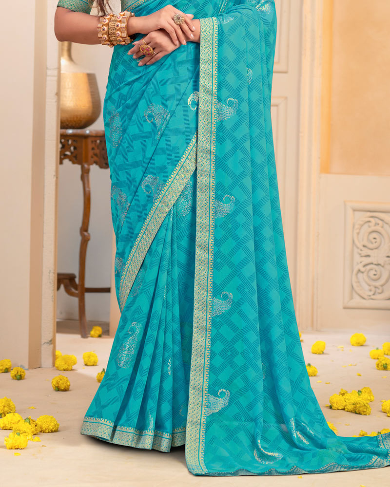 Vishal Prints Pacific Blue Georgette Saree With Foil Print And Zari Border