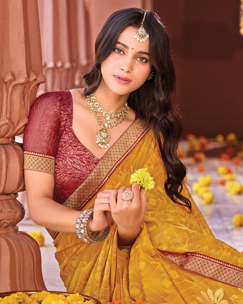 Vishal Prints Brownish Mustard Designer Georgette Saree With Foil Print And Zari Border