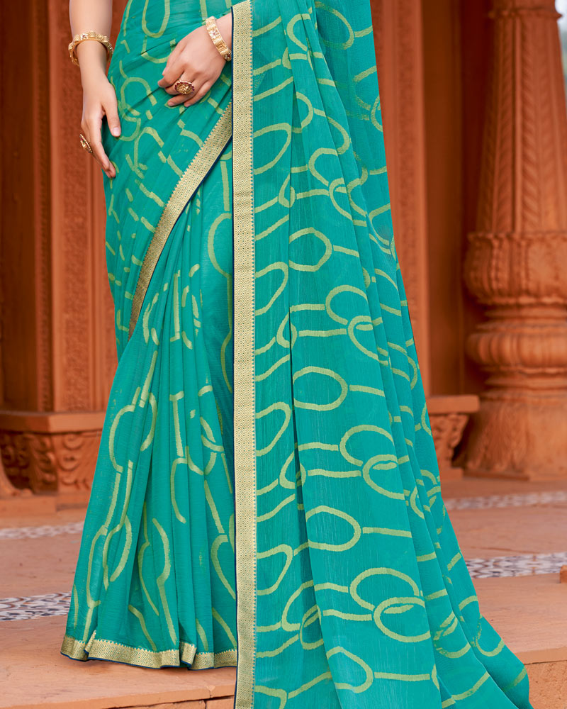 Vishal Prints Teal Blue Printed Chiffon-Brasso Saree With Zari Border