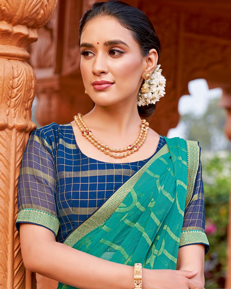 Vishal Prints Teal Blue Printed Chiffon-Brasso Saree With Zari Border