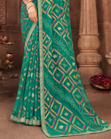 Vishal Prints Teal Green Brasso Saree With Foil Print And Zari Border