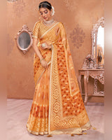 Vishal Prints Pastel Orange Tissue Brasso Saree With Tassel
