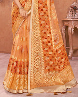 Vishal Prints Pastel Orange Tissue Brasso Saree With Tassel